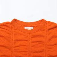 MEYAME / TUCKED JACQUARD PULLOVER ORANGE